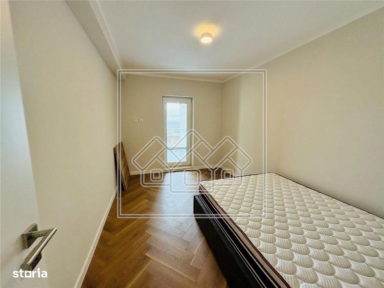 Ap. 3 camere, 2 bai si terasa 15,44 mp - decomandat - prima inchiriere - 3