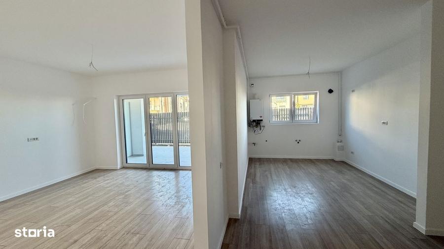 3 camere , parter cu curte proprie - 15