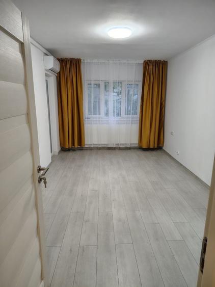 Apartament de 65 mp cu 2 camere si 2 balcoane, semidecomandat, etaj 3 - 5