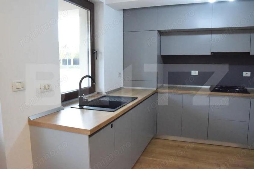 Apartament cu 5 camere, 3 bai, curte situat in vila, zona Tractorul - 10