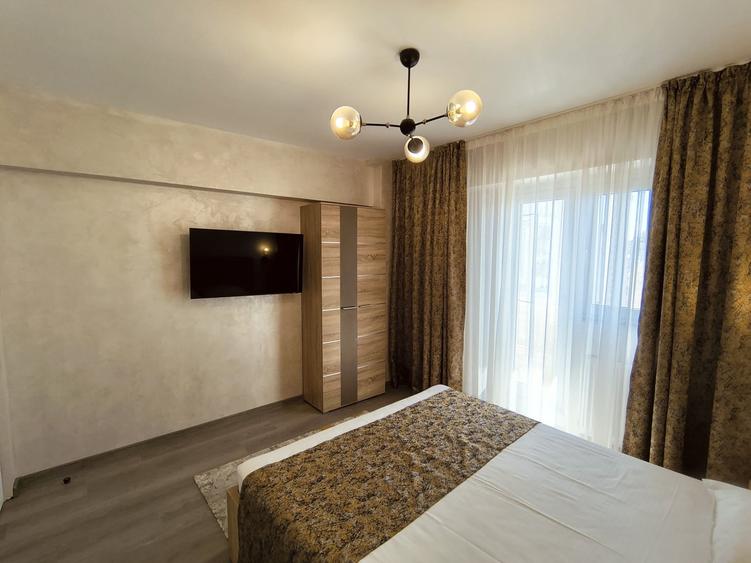 Apartament cu 3 camere, mobilat în Faleza Nord