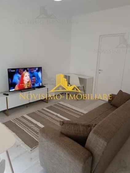 GARSONIERA DE INCHIRIAT  IN BLOC NOU , ZONA VEST - 2