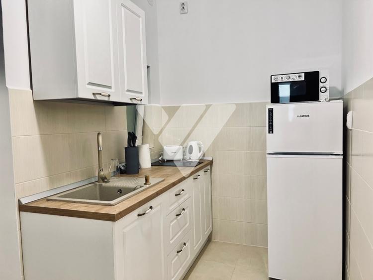 Apartament cu 2 camere semidecomandat, mobilat în Central