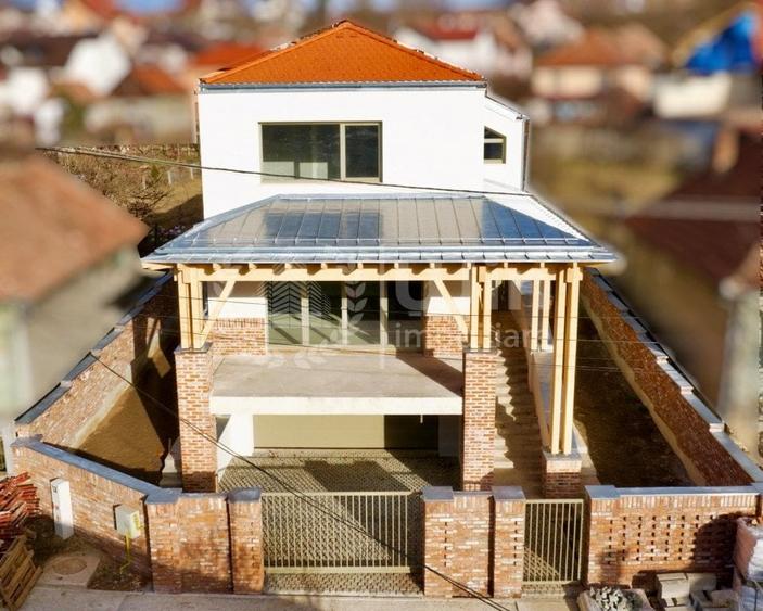 Casa cu 4 camere | 234mp util | Teren 596mp | Garaj | Dambul Rotund - 1