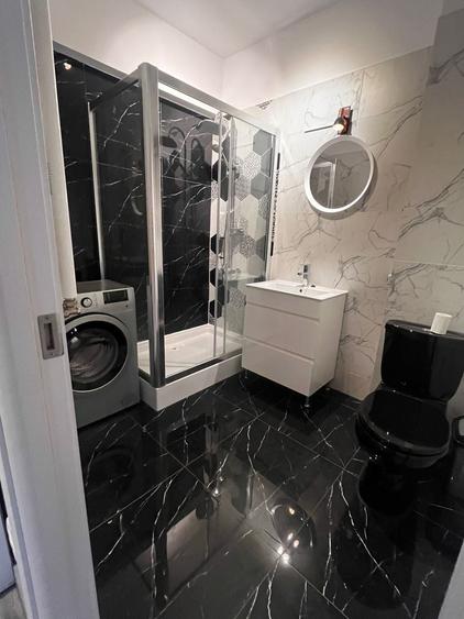 Oază de liniște la Unirii: Apartament modern în bloc nou, costuri minime - 4