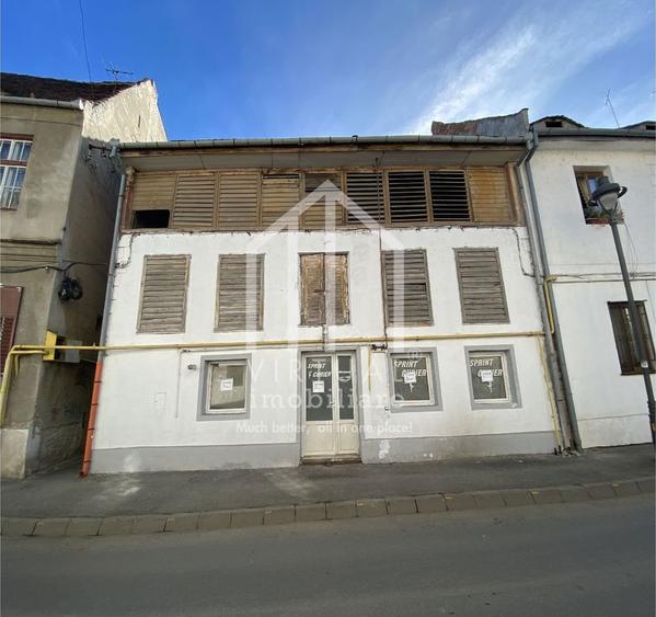 Casa individuala in zona centrala, P + 3 , pretabil pentru investitii. - 1