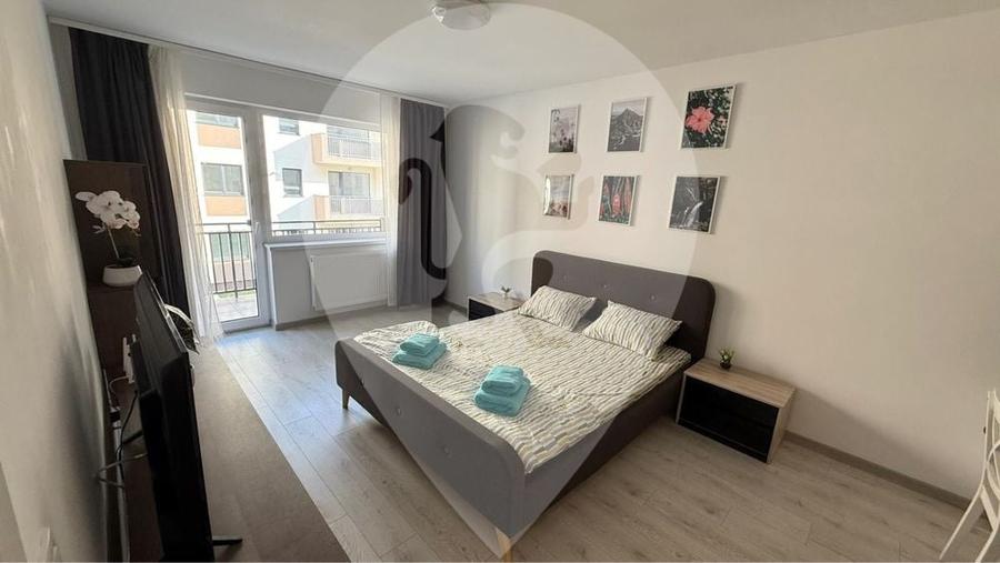 Garsoniera spatioasa 45 mp + balcon + loc parcare inclus - 1