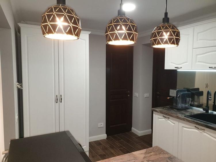 Garsoniera superfinisata si mobilata lux - langa str. Sforii - 40