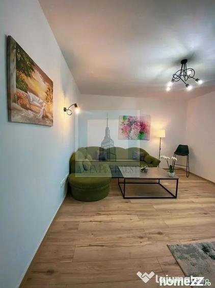 Apartament cu 3 camere decomandat în Tractorul