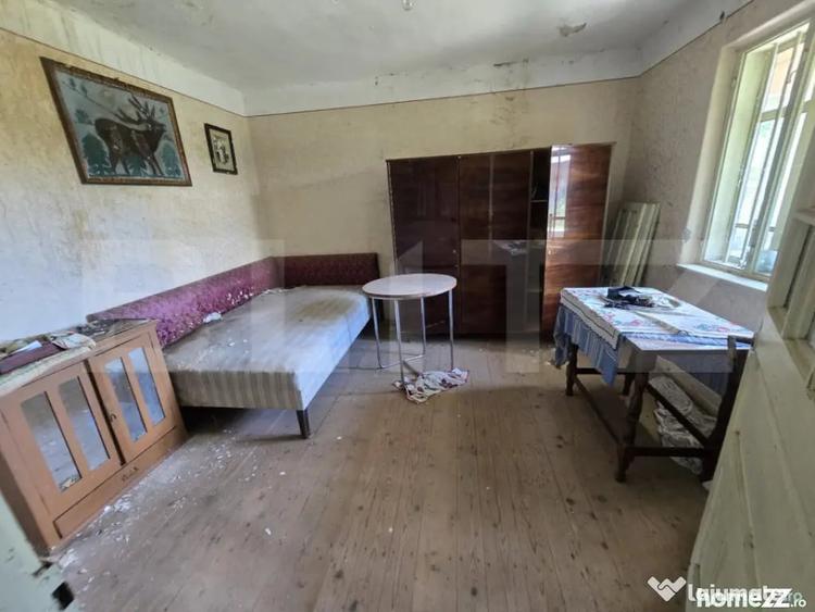 Casă cu 3 camere cu Teren 1954 Mp în Tomșani