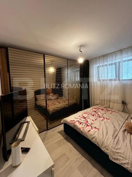 Apartament 2 camere, 51 mp, decomandat - demisol uscat, ideal de locuit.