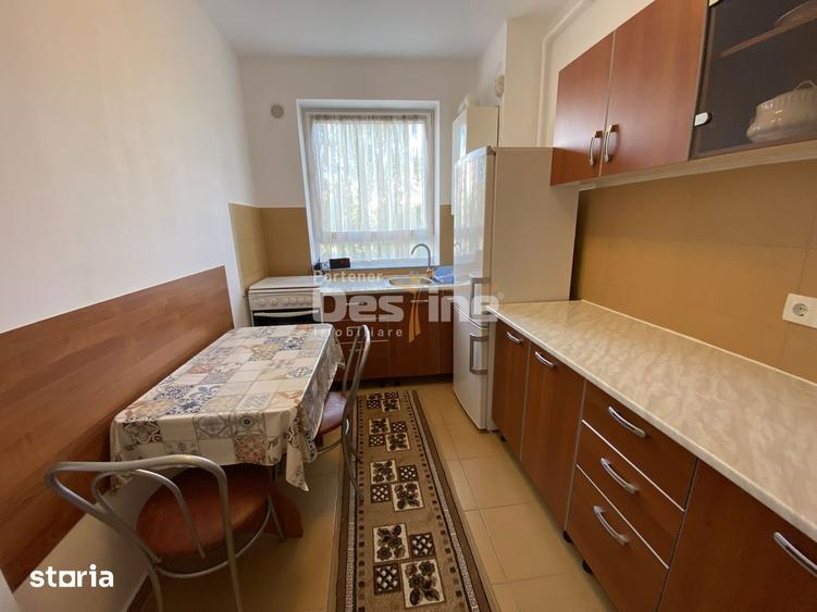 Garsoniera situata la etaj intermediar, cu balcon si loc de parcare, A - 4