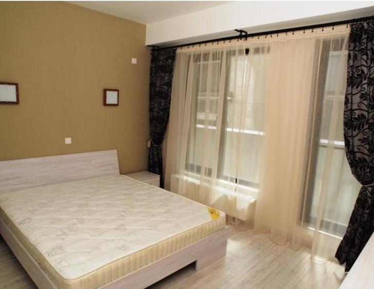 ASE -  Romana - Dorobanti - nou - 2 camere - mobilat modern - centrala termica - 1