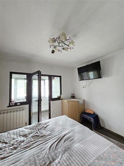 IN EXVLUSIVITATE APARTAMENT 2 CAMERE PARTER DE VANZARE IN ONESTI - 4