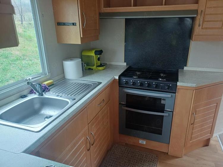 De vanzare casa pe roti , 3 dormitoare , 2 bai, living si bucatarie, mobilat utilat , pre? 21800 E - 5