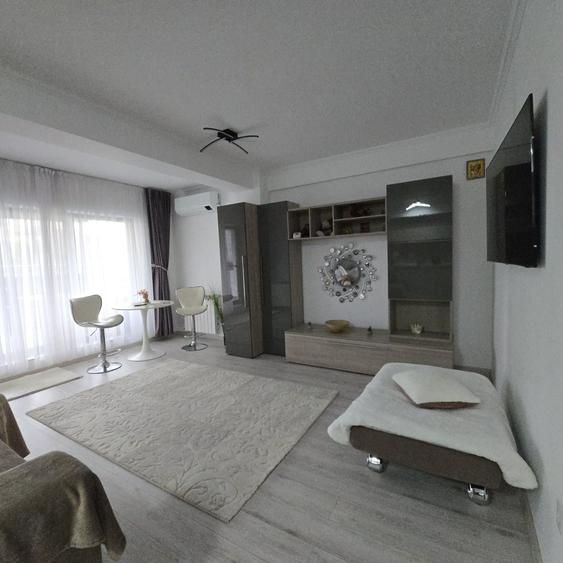 De inchiriat apartament in bloc NOU 0740,583zona central,582 - 4