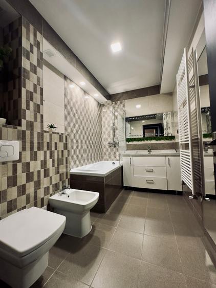 Apartament cu 3 camere si 2 grupuri sanitare in zona Tractorul la Isaran,et7/10 - 11