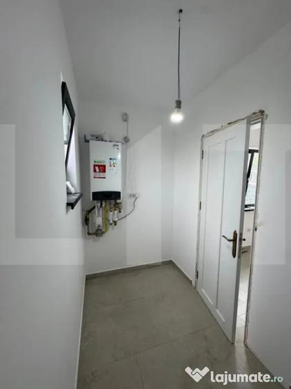 Casă cu 4 camere cu Teren 1250 Mp în Curtești