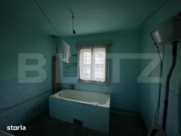 Casă cu 4 camere cu Teren 2000 Mp în Central