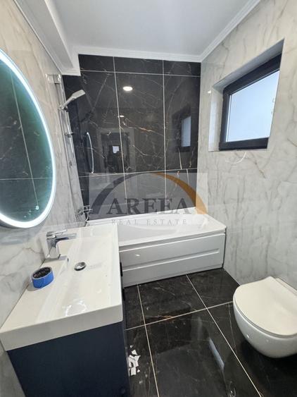 Casă individuală cu 4 camere cu Canalizare în Tunari