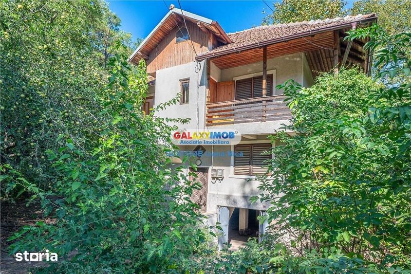 Casă cu 7 camere cu Teren 1000 Mp în Central