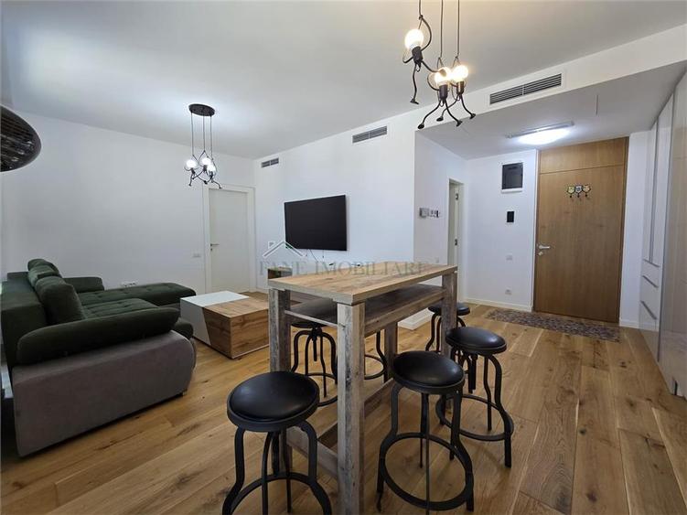 Apartament cu 2 camere semidecomandat, mobilat în Tunari