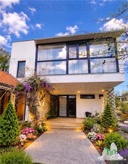 Casă individuală cu 7 camere cu Teren 1000 Mp în Corbeanca