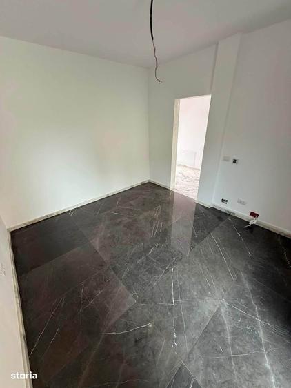 Casă cu 4 camere cu Teren 338 Mp în Central