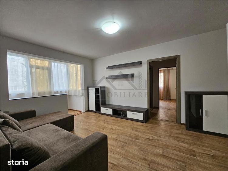 Apartament cu 2 camere semidecomandat, mobilat în Podu Roș