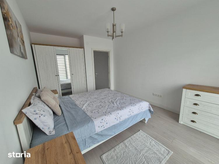 Bdul Bucuresti, nou, ap 2 camere cu centrala si AC, 450 euro, et 4/9 - 10
