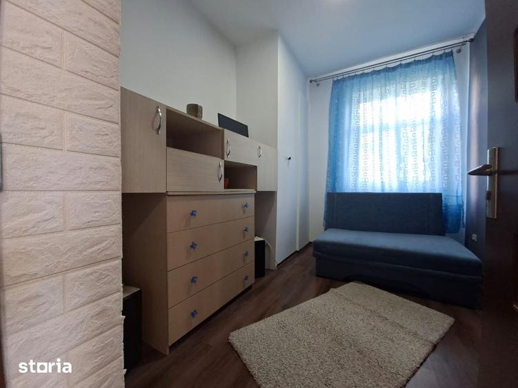 Apartament cu 2 camere decomandat în Tractorul