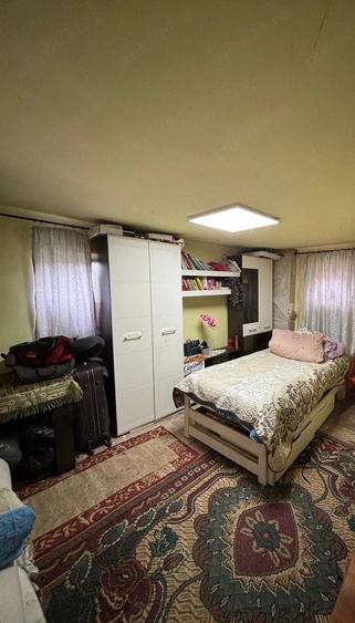 Casă cu 2 camere cu Teren 1400 Mp în Central