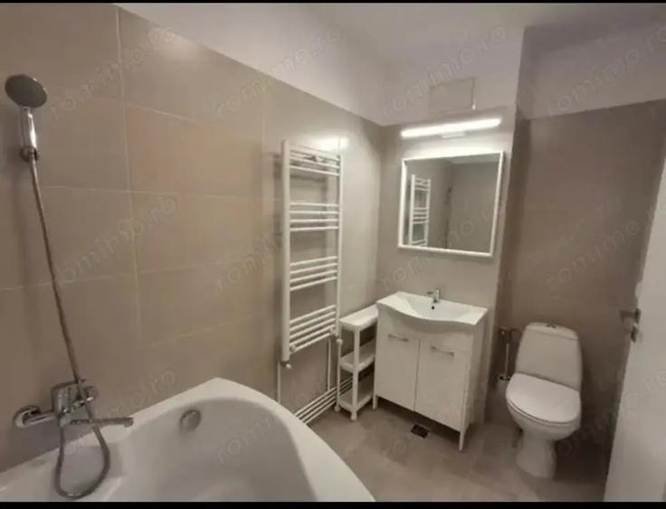 Apartament cu 3 camere semidecomandat, mobilat în Take Ionescu
