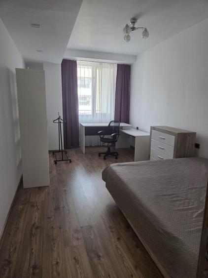 Apartament cu 3 camere decomandat în Tractorul
