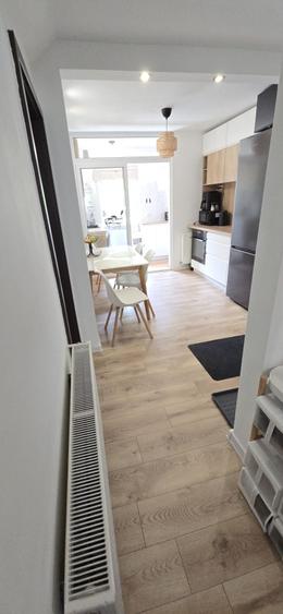 Apartament cu 3 camere decomandat în Tractorul