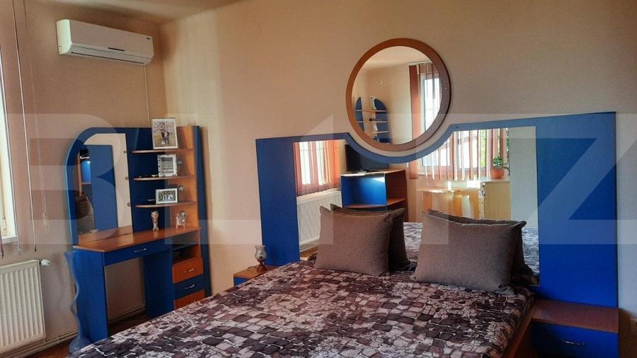 Casă individuală cu 9 camere cu Teren 868 Mp în Est
