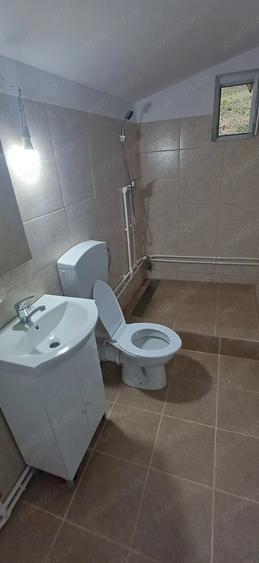 Casă cu 4 camere cu Teren 1200 Mp în Lopatnița
