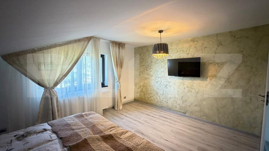 Casă individuală cu 6 camere cu Teren 2000 Mp în Exterior Est