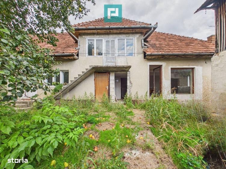 Casă cu 4 camere în Buteni