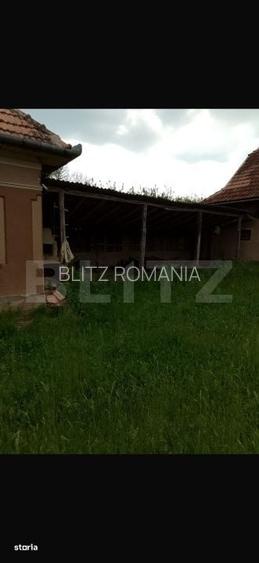 Casa cu 3 camere si un teren de 3000 mp, zona Cuzaplac