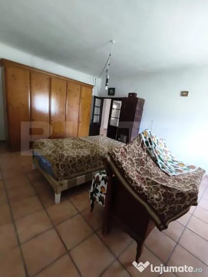 Casă cu 3 camere cu Teren 1400 Mp în Central