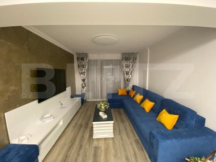 Apartament cu 3 camere semidecomandat, mobilat în Calea București