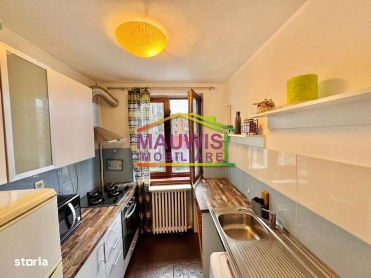 Apartament cu 2 camere semidecomandat, mobilat în Romană