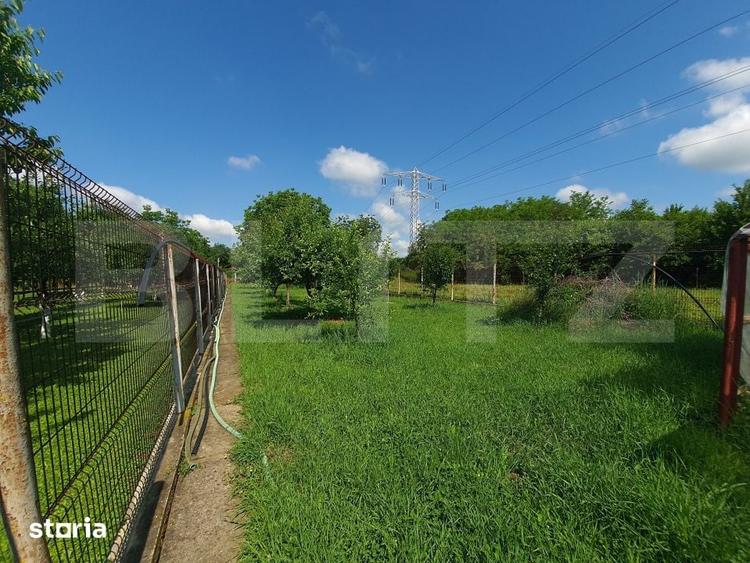 Casă cu 5 camere cu Teren 2022.35 Mp în Răzvad
