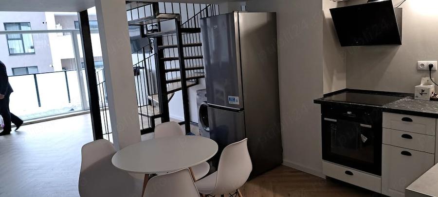 Inchiriez apartament tip loft, cu 2 camere, 2 bai, in centru, str Ploiesti (pta M. VITEAZU) - 10