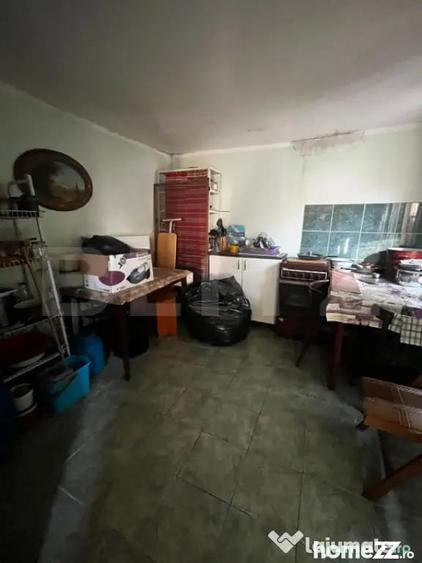 Casă cu 4 camere cu Teren 100 Mp în Central