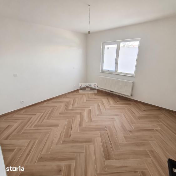 Apartament cu 4 camere decomandat în Străoane