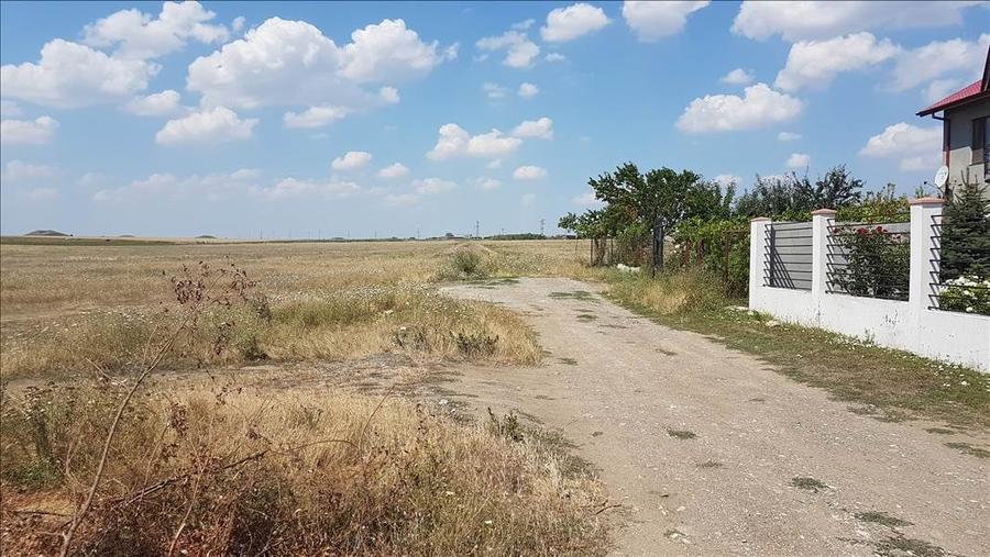 TEREN INTRAVILAN CONSTRUIBIL 469 MP. LANGA CASE ZONA IN DEZVOLTARE PRET 17.500 E - 5