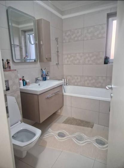 Etaj 1. Bucatarie inchisa. 2 Bai. 2 Locuri de Parcare. - 13