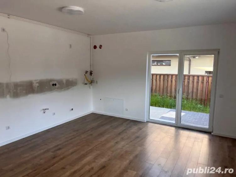 Ap de vanzare cu 2 camere ?i gradina nou finisat in Flore?ti zona Tau?iului parcare - 10